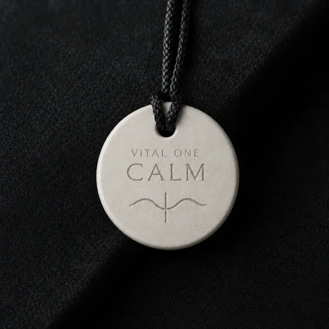 VITAL ONE CALM one-of-one energy amulet on black fabric